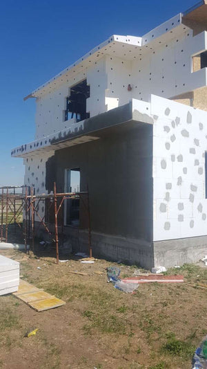Projet de système d'isolation thermique pour une maison en structure métallique à Domnesti thumbnail