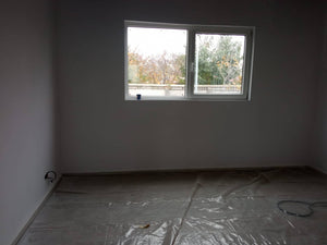 Revêtement intérieur en plaques de plâtre résistant au feu et à l'acoustique pour une halle métallique thumbnail