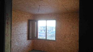 Revêtement intérieur et extérieur en OSB, installation de plaques de plâtre pour un projet de maison de 191 mètres carrés thumbnail