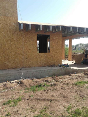 Revêtement intérieur et extérieur en OSB pour un projet de maison de 294 mètres carrés thumbnail
