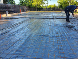 Plantation de fer pour la plaque de niveau zéro au-dessus du sol pour une maison de plain-pied en cours de construction thumbnail