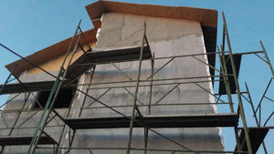 Projet de maison à un stade où l'enduit est appliqué sur les façades thumbnail