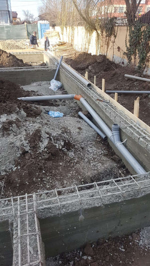 Projet de halle métallique de désenclavement de la fondation et installation des installations sanitaires thumbnail