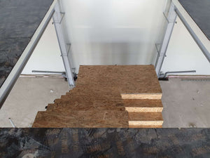 Conception et installation d'un escalier métallique à deux rampes avec un palier thumbnail