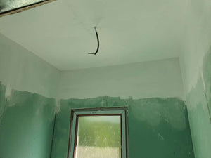 Ponçage, préparation et application d'une couche d'apprêt pour une maison métallique de plain-pied thumbnail