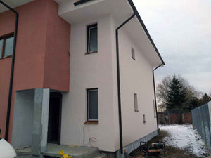 Application d'enduit décoratif siliconé pour la maison en métal modèle de 191 mètres carrés thumbnail