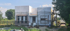 Isolation thermique extérieure à la laine de roche et enduit de finition pour la construction d'une maison de 130 mètres carrés thumbnail