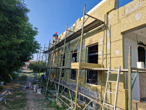 Isolation thermique extérieure à la laine de roche et enduit de finition pour la construction d'une maison de 130 mètres carrés thumbnail