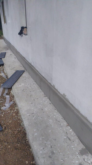 Trottoirs périphériques pour une maison sur structure métallique thumbnail