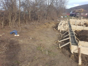 Couler des poutres de fondation pour une pension agrotouristique de 220 mètres carrés thumbnail