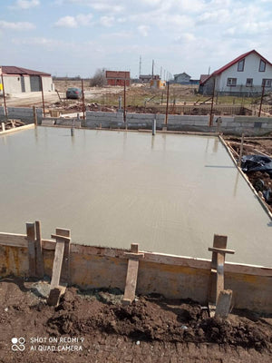 Couler une dalle de fondation hors sol pour une maison à structure métallique avec rez-de-chaussée et 1 étage thumbnail