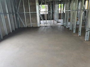 Couler une chape mécanisée pour une maison de plain-pied à structure métallique thumbnail